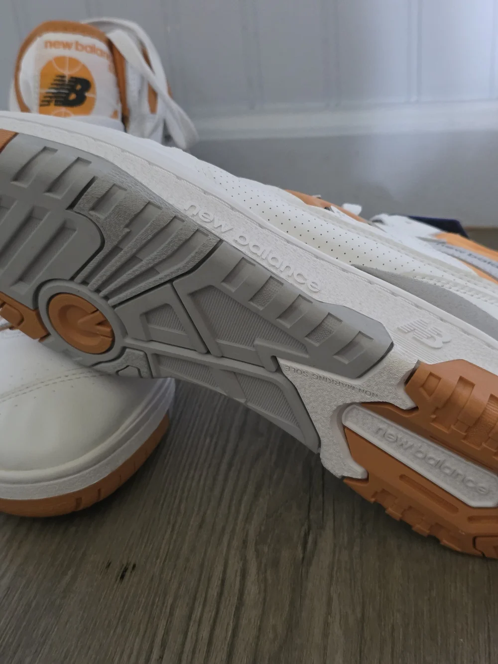New Balance White and Orange Mid-Top Athletic Sneakers